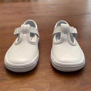 Keds toddler size 6M. Never been worn (see picture of soles). Super cute!